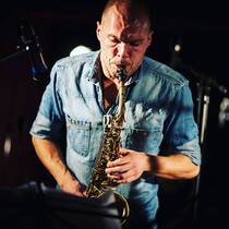 A musician playing the saxophone
